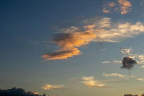 Cloudscape at Sunset with Golden Light Stock Photos