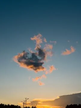 Cloudscape at Sunset with Golden Light Stock Photos