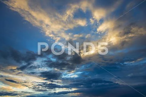 Cloudscape at sunset Stock Photos