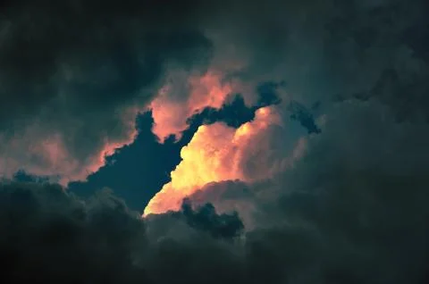 Cloudscape at sunset with red cloud Stock Photos