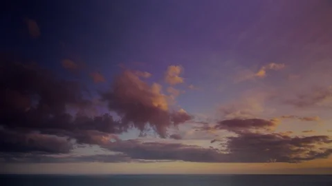 Cloudscape at sunset. The sky is gradually filled by colorful clouds. Stock Footage 87191053