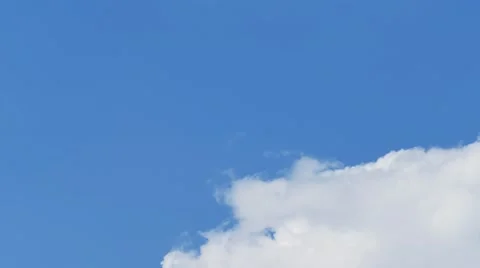 Cloudscape time-lapse 4k video: rolling cumulus clouds moving blue sky sunny day Stock Footage 68636972