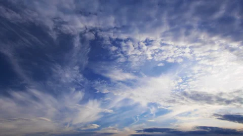 Cloudscape time-lapse, white clouds running across the blue sky. Stock Footage 38138634