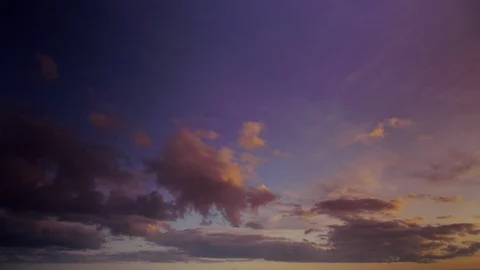 Cloudscape in timelapse at sunset. Sky is gradually filled by colorful clouds. Stock Footage 87333560