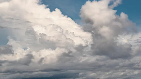 Cloudscape Transforming Timelapse: Dynamic Cloud Formation in Blue Sky. Graceful Video stock 316657450