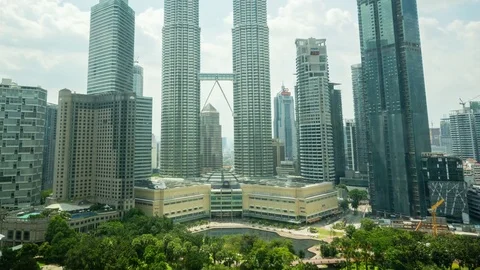 Cloudscape view of the Petronas Twin Towers and Kuala Lumpur City Centre KLCC Stock Footage 83274768