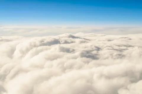 Cloudscape viewed from airplane Stock Photos