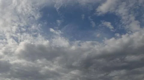 Cloudscape white clouds float in azure sky Stock Photos