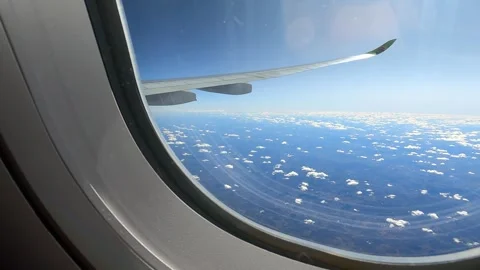 Cloudscapes Captured Through Airplane Windows Stock Footage 279674900