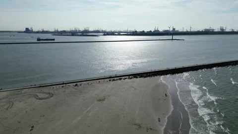 Cloudy Aerial View of The Hague Beach with Container Port in Background Stock Footage 251758868