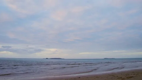 A cloudy afternoon at the beach Stock Footage 80426970
