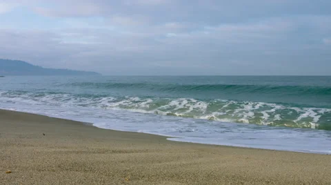 Cloudy afternoon at deserted beach after rough weather 4K Stock Footage 61309718
