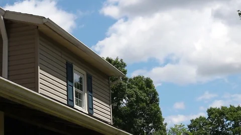 Cloudy Afternoon Timelapse over a small suburban window in america Stock Footage 78532712