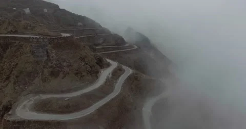 Cloudy and Curvy Mountain Road Stock Footage 141247992