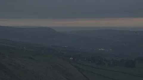 Cloudy and Moody Sunset UK Stock Footage 104602987