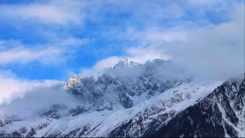 Cloudy and snowy mountains of Chamonix France. Video stock 100615267