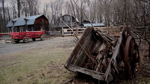 Cloudy autumn scenery, rustic sugar shack, woods, traveling left Stock Footage 87346497