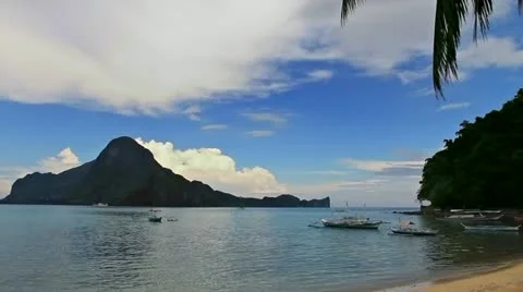 Cloudy beach and mountains Stock Footage 11333036