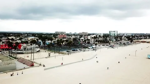 Cloudy Beach Day on Venice beach, California. Drone, aerial shot lifting Stock Footage 146147267