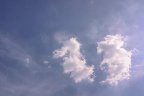 The cloudy beautiful sky with the light shining from the sun. Stock Photos