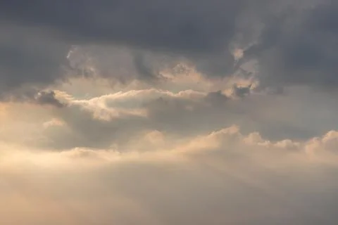 The cloudy beautiful sky with the light shining from the sun. Stock Photos