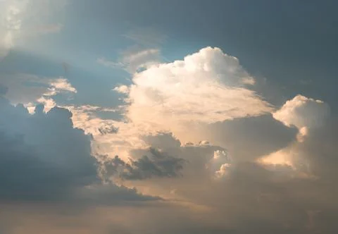 The cloudy beautiful sky with the light shining from the sun. The softness of Stock Photos
