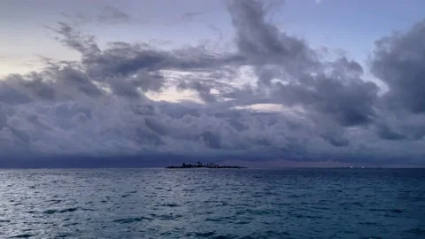 Cloudy blue ocean island 4k 24 fps H264 Stock Footage 235543463