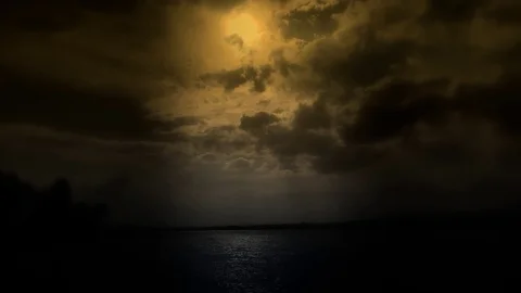 'cloudy blue sky above a black surface of the sea'' Stock Footage 81747142