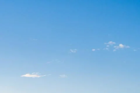 Cloudy blue sky abstract background, blue sky background with tiny clouds Foto stock