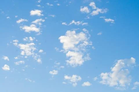 Cloudy blue sky abstract background, blue sky background with tiny clouds Stock Photos