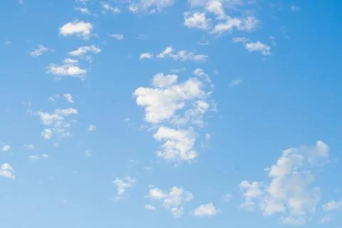 Cloudy blue sky abstract background, blue sky background with tiny clouds Stock Photos