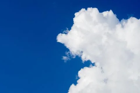 Cloudy blue sky abstract background, blue sky background with tiny clouds, bl Stock Photos