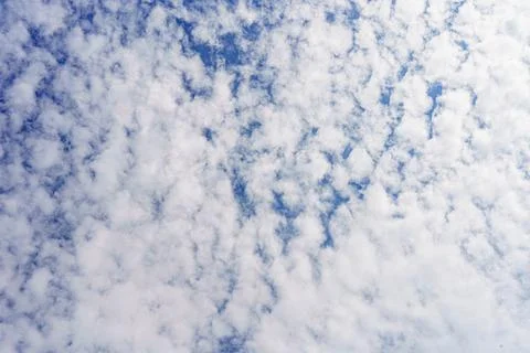 Cloudy blue sky abstract background, blue sky background with tiny clouds Stock Photos