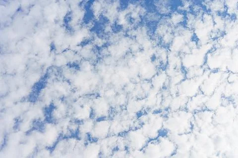 Cloudy blue sky abstract background, blue sky background with tiny clouds Stock Photos
