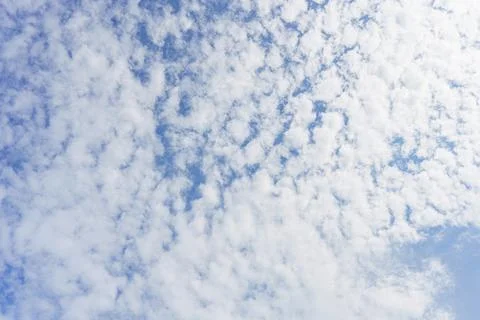Cloudy blue sky abstract background, blue sky background with tiny clouds Stock Photos