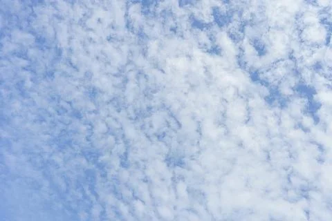 Cloudy blue sky abstract background, blue sky background with tiny clouds Stock-Fotos