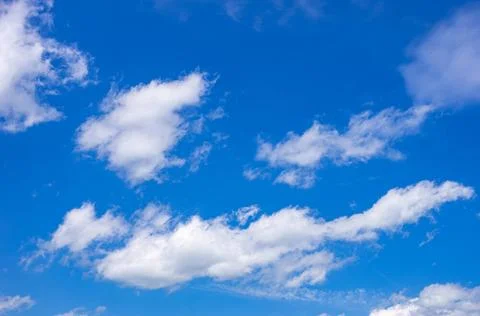 Cloudy Blue Sky Background Background of cloud formations against a blue s... 스톡 사진