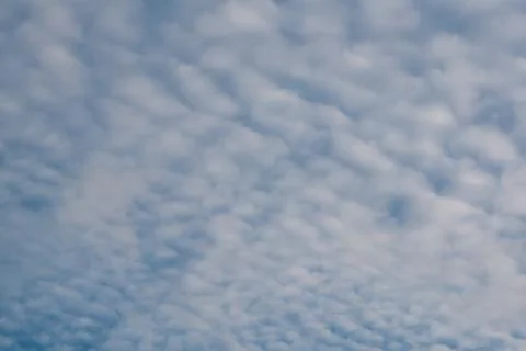 Cloudy blue sky background Stock Photos