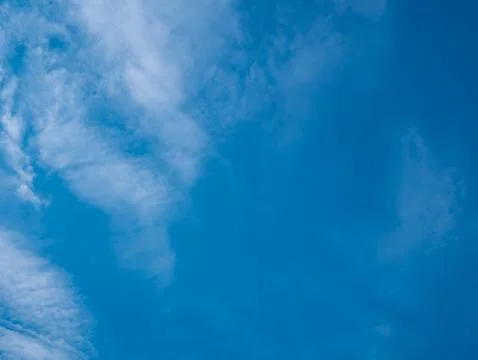 Cloudy blue sky background Stock Photos