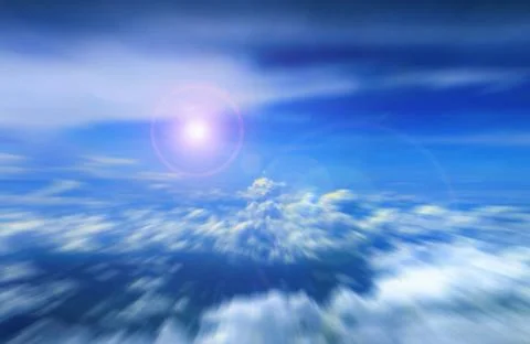Cloudy blue sky with bright sunlight Stock Photos