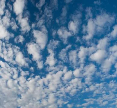 Cloudy blue sky Stock Photos