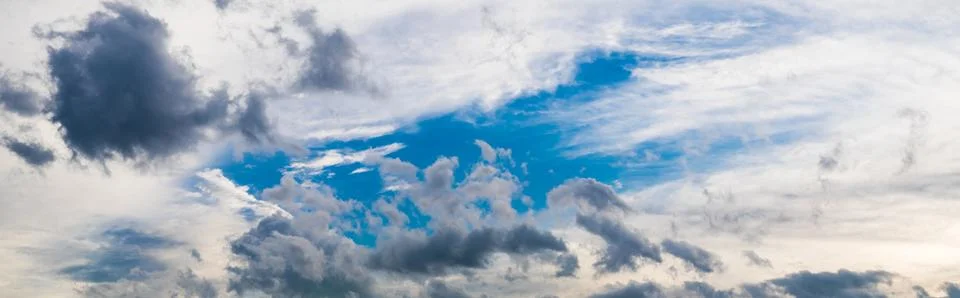Cloudy blue sky. Stock Photos