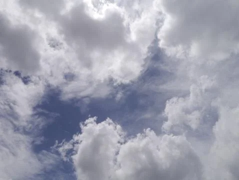 Cloudy blue sky Stock Photos