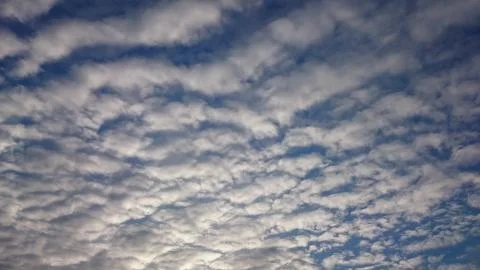 Cloudy blue sky Stock Photos