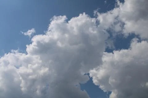 Cloudy blue sky Stock Photos