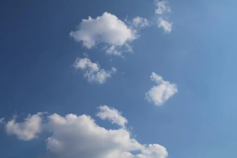 Cloudy blue sky Stock Photos