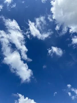 Cloudy blue sky Stock Photos