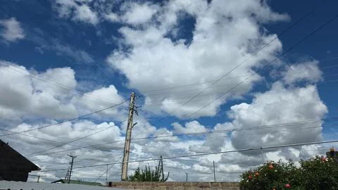 Cloudy Blue Sky with power Lines Stock Photos
