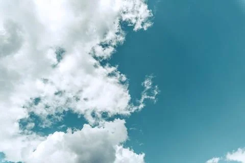 Cloudy blue sky in the summer. Stock Photos