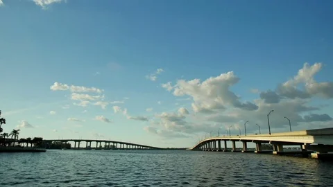 Cloudy Blue sky time lapse with bridges Stock Footage 81830983